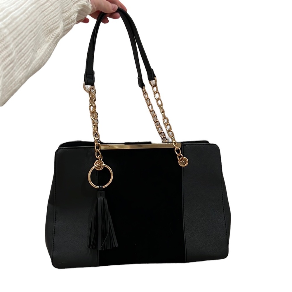 Black shoulder bag with gold chain strap